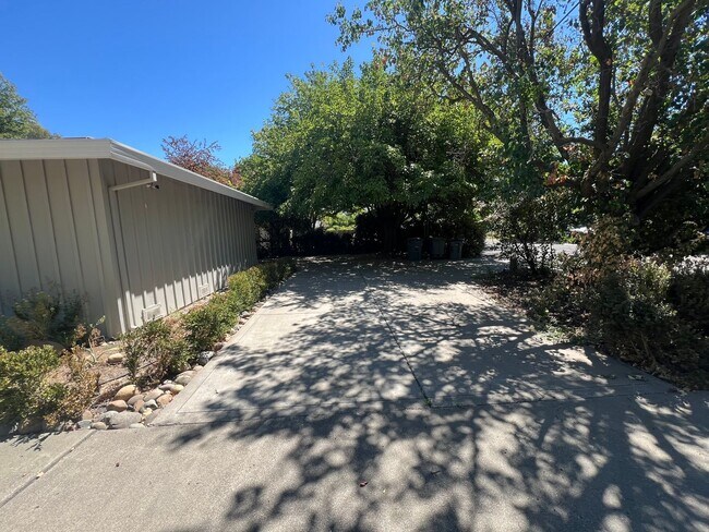 Building Photo - Experience Tranquil Living on Nearly Half ...
