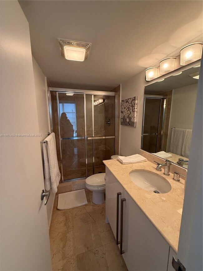 Building Photo - 10275 Collins Ave