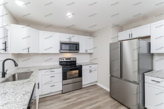 Building Photo - 10706 Ewing Ave