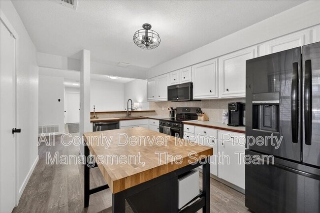 Building Photo - 7250 S Gaylord St