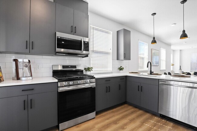 Building Photo - 1 Month Free! Brand New Townhomes in the h...