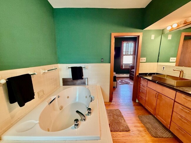 Building Photo - SPACIOUS & MODERN 3 BED/2.5 BA HOUSE w/ AC-Inlaid HARDWOOD Flooring-WASHER/DRYER & Rear PATIO in ...