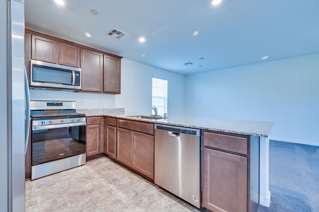 Building Photo - SE!!  Gated!! Community Pool!! Clubhouse!! Fitness Center!! Up Graded Appliances!!! 2 Car Garage!!