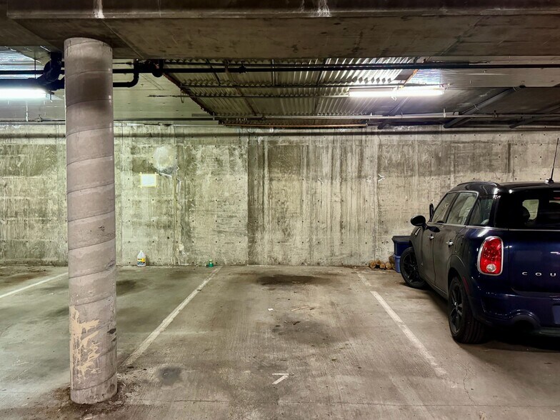 Enjoy the convenience and security of dedicated garage parking, providing easy access & security - 2145 Dexter Ave N