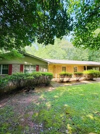 Building Photo - Available now,  3/2 with large unfinished basement, in University Heights