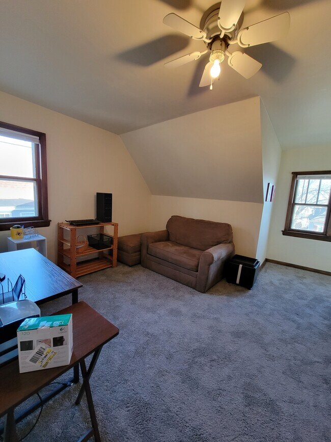 Bedroom 2 showing loveseat & office set-up - 2215 N 70th St