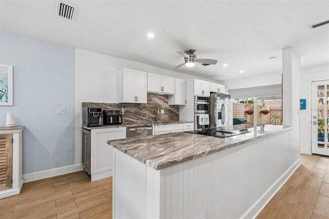 Building Photo - 392 Boca Ciega Point Blvd N