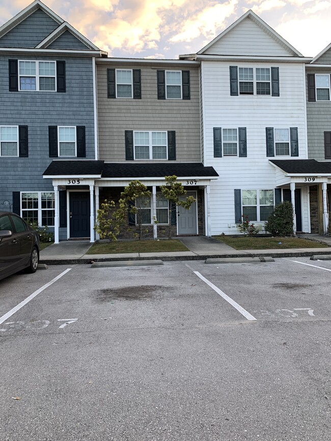 Front of Property - Two Assigned Parking Spots - 307 Caldwell Loop