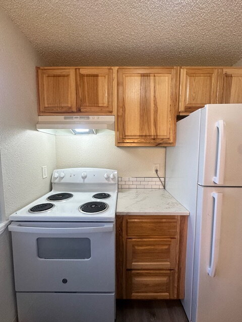 Building Photo - 2-Bedroom, First Floor Corner Unit with Laminate Flooring