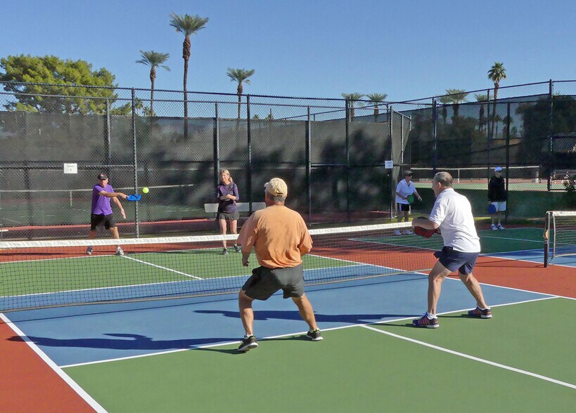 Sunrise CC tennis - 72 Majorca Dr