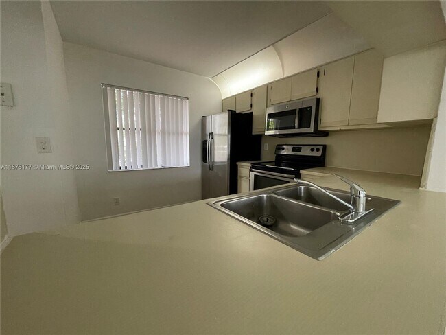 Building Photo - 2390 Coral Springs Dr