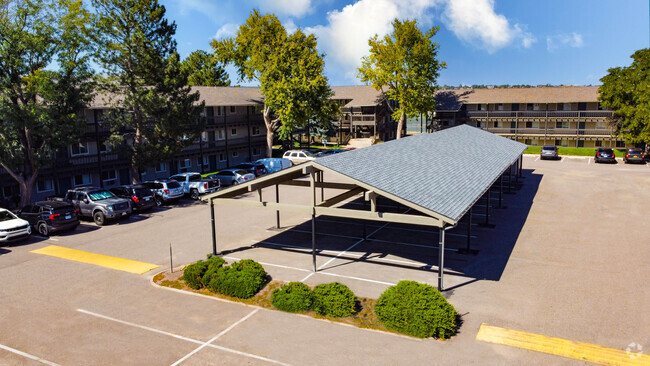 BRAND NEW Carports! Reserved Covered Parking. Limited Availability - Bear Valley Village Apartments