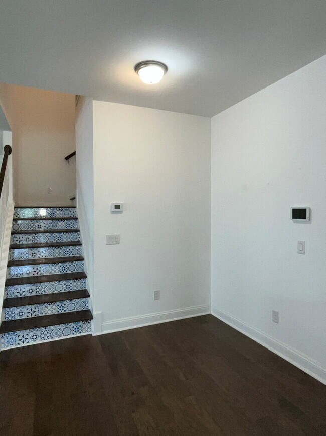 Building Photo - "Spacious 4-Bed Oasis with Stunning Lake V...
