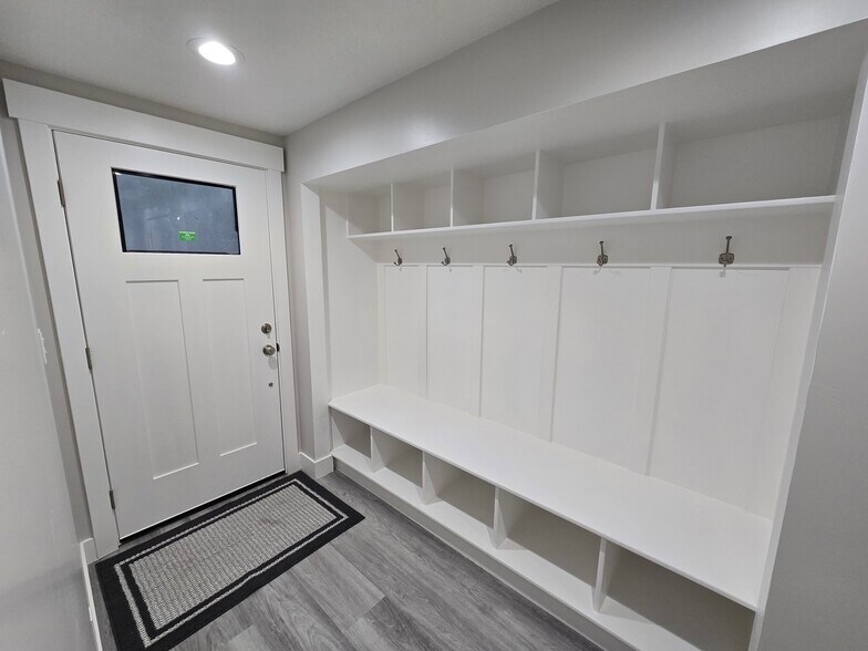 Front entrance with mud locker and storage - 2431 E Weeping Willow Way