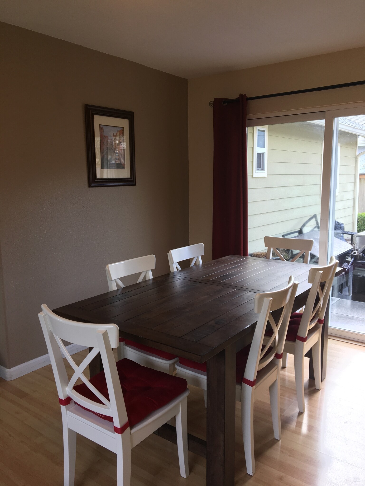 Dining room opens to patio with slider door. - 421 N 6th Ave SW