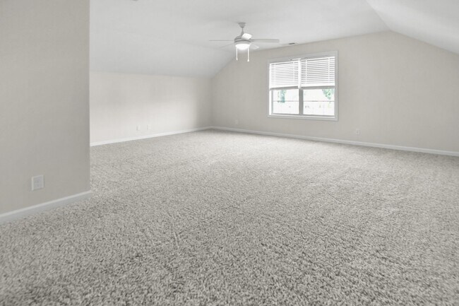 Building Photo - Like New Three Bedroom with Bonus!