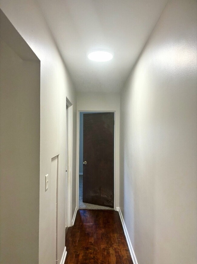 Building Photo - "Charming Saginaw Duplex: Spacious 2-Bedroom Haven with Gleaming Hardwood Floors!"