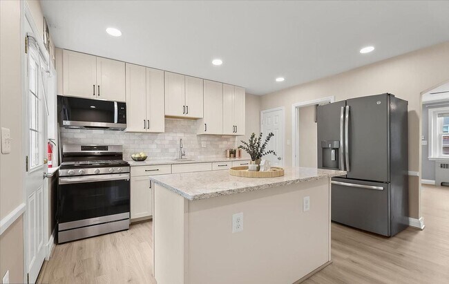 Building Photo - Updated 3BR Catonsville Townhome | Rear Parking + Deck