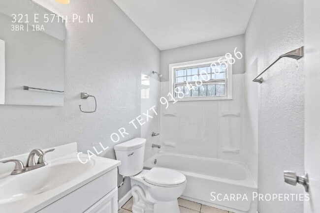 Building Photo - 321 E 57th Pl N