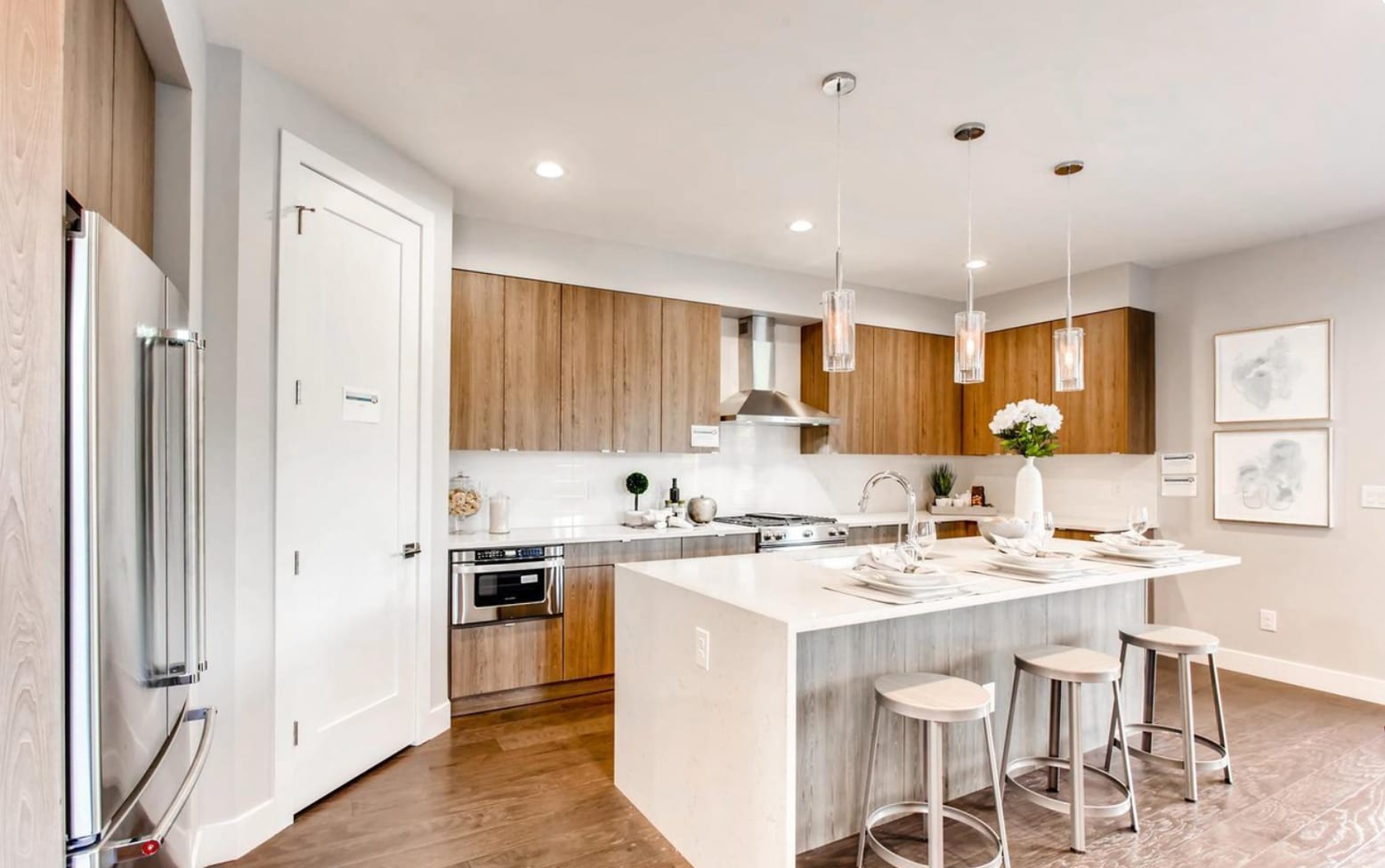 Waterfall Quartz countertop and Kitchenaid appliances and a walk-in pantry - 2765 S Sherman St