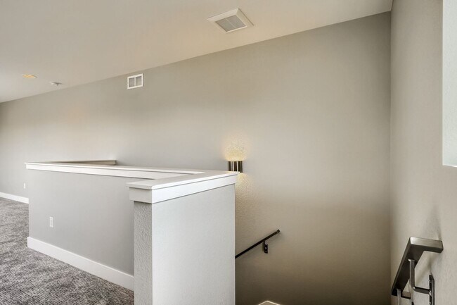 Building Photo - 3 bedroom / 3.5 bath Townhome + 2 Large Flex Spaces & Spacious Roof Top Deck!
