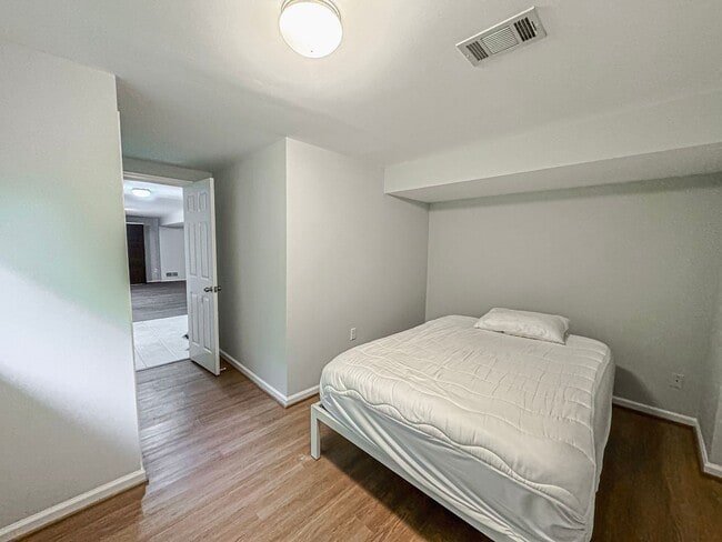 Building Photo - Sought-After 4 Bed 3 Bath L-Shaped Rambler...