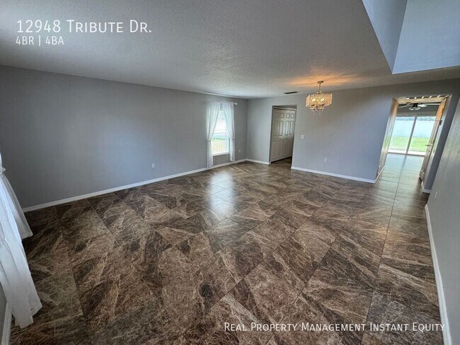 Building Photo - 12948 Tribute Dr