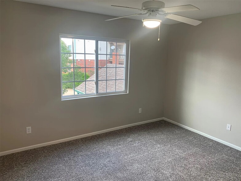 Master Bedroom with a private full bath. - 105 NW 8th St