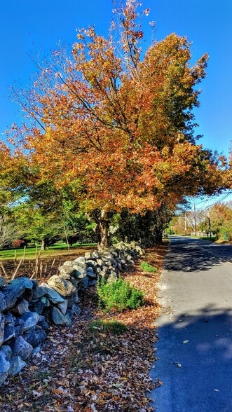 Stone walls line the property. - 94 Cross Rd