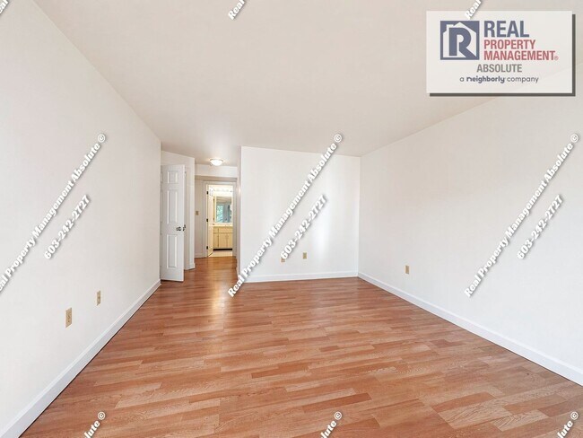 Building Photo - Spacious 2BR/2BA Condo with Garage, Balcony, Pool & Mine Falls Access