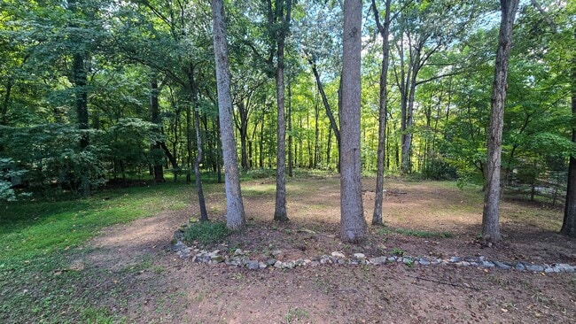 Building Photo - 5607 Whispering Pines Dr