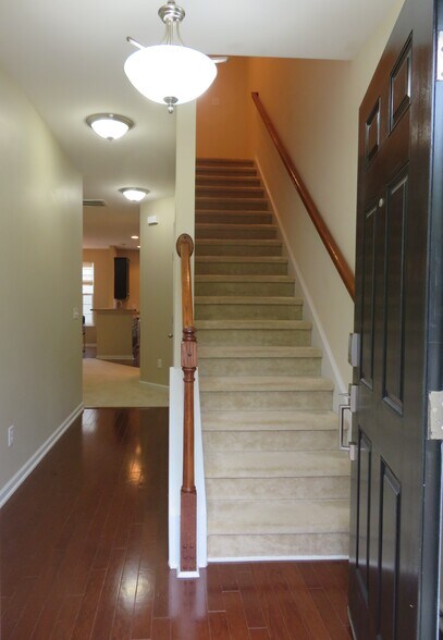 Foyer-left to Great Room,Dining,Kitchen,1/2 Bath, or right to Beds,Baths,Laundry - 2496 Stadium Dr