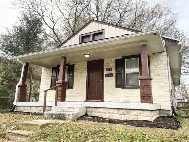 Primary Photo - 4 Bedroom Home with covered front porch