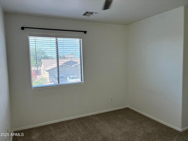 Building Photo - 7287 S Sunrise Way
