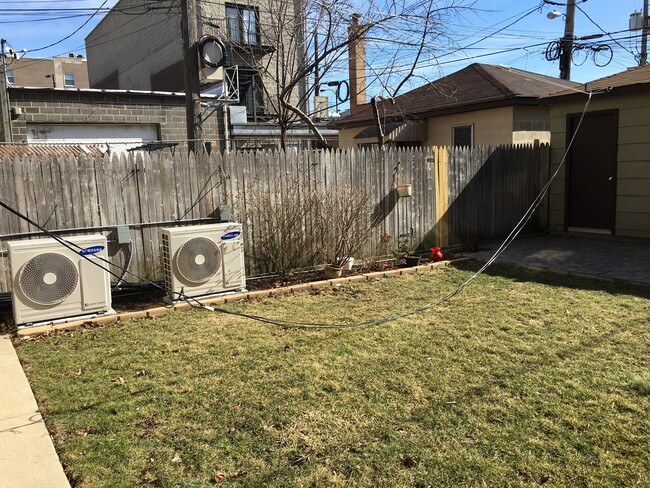 Fenced Back yard with AC units - 2415 W Cortland St