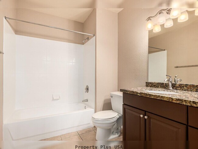 Building Photo - "Unique 3-Bed, 2-Bath Condo with 2 car attached garage located in Prime Scottsdale Location!"