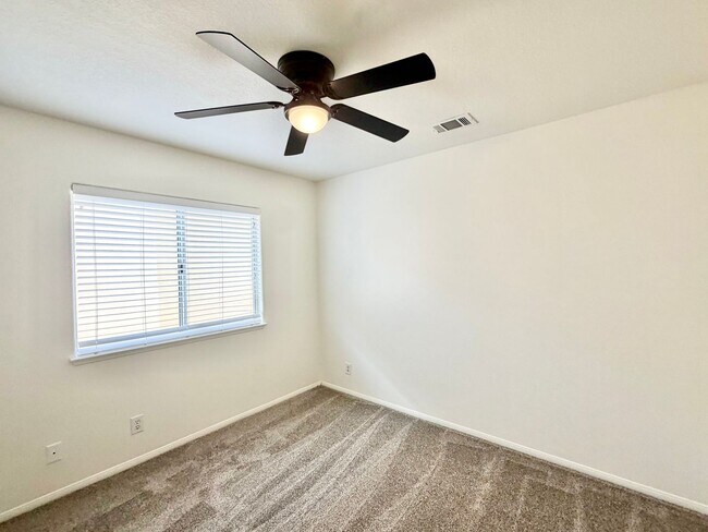 Building Photo - Spacious 5 Bedroom 3 Bathroom Home with Updated Paint, New Roof & Private Balcony