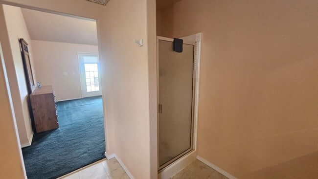Building Photo - Out of town house with double garage and l...