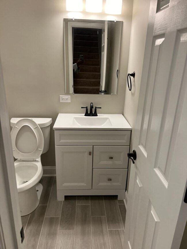 Building Photo - Spacious Newly Renovated Basement with Pri...