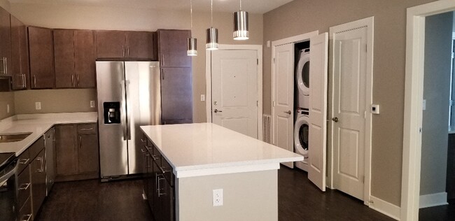 Kitchen, laundry, entry way - Panorama Estates