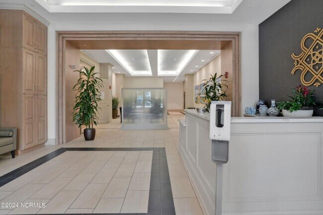 Building Photo - Welcome to your dream condo in the heart o...