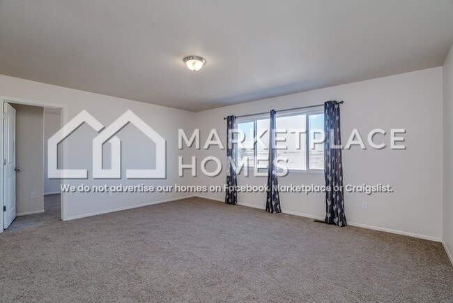 Building Photo - 9799 Desert Lily Cir