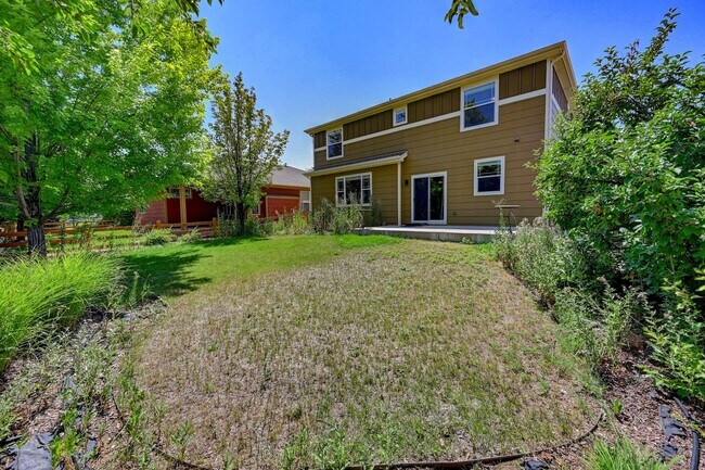 Building Photo - 5 bedroom, 4 bath home with 2 car attached garage