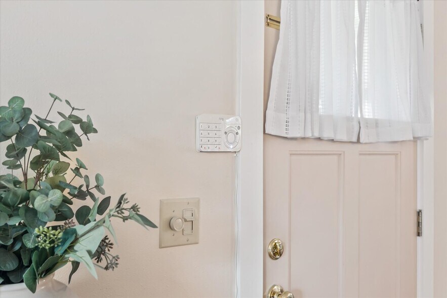Ring security system with sensors on all doors and windows, video doorbell and video flood light - 8042 Earl Ave NW