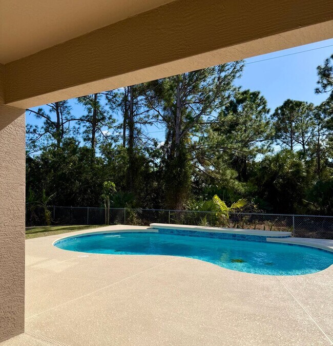 Building Photo - Palm Bay Pool Home Stunner!