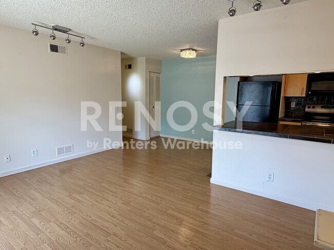 Building Photo - Extremely Well Located and Updated 2 Bed/ 1 Bath Condo with direct Garage Access