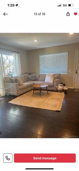 Open concept living room with tons of natural light. - 357 Winsome Pl
