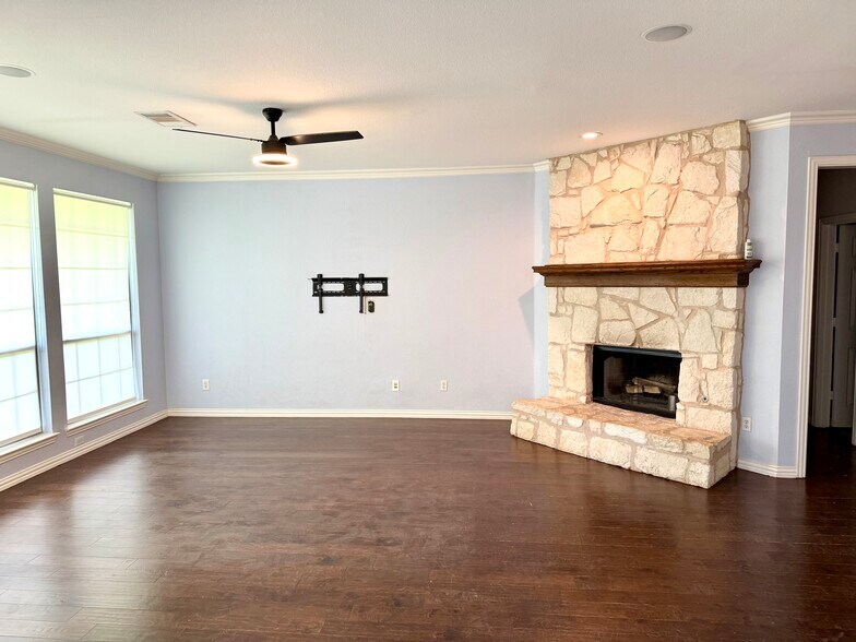 Living Room with TV mount, prewired (included). Fireplace (Wood burning, gas starter) - 2489 Yuma Dr