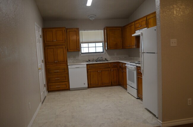 Building Photo - This 3 Bedroom Home with Fireplace is a must see!