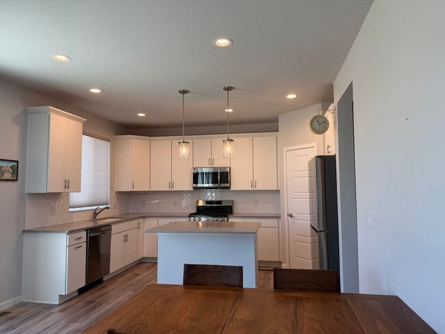 Building Photo - Stunning Luxury Living in Coal Creek with ...